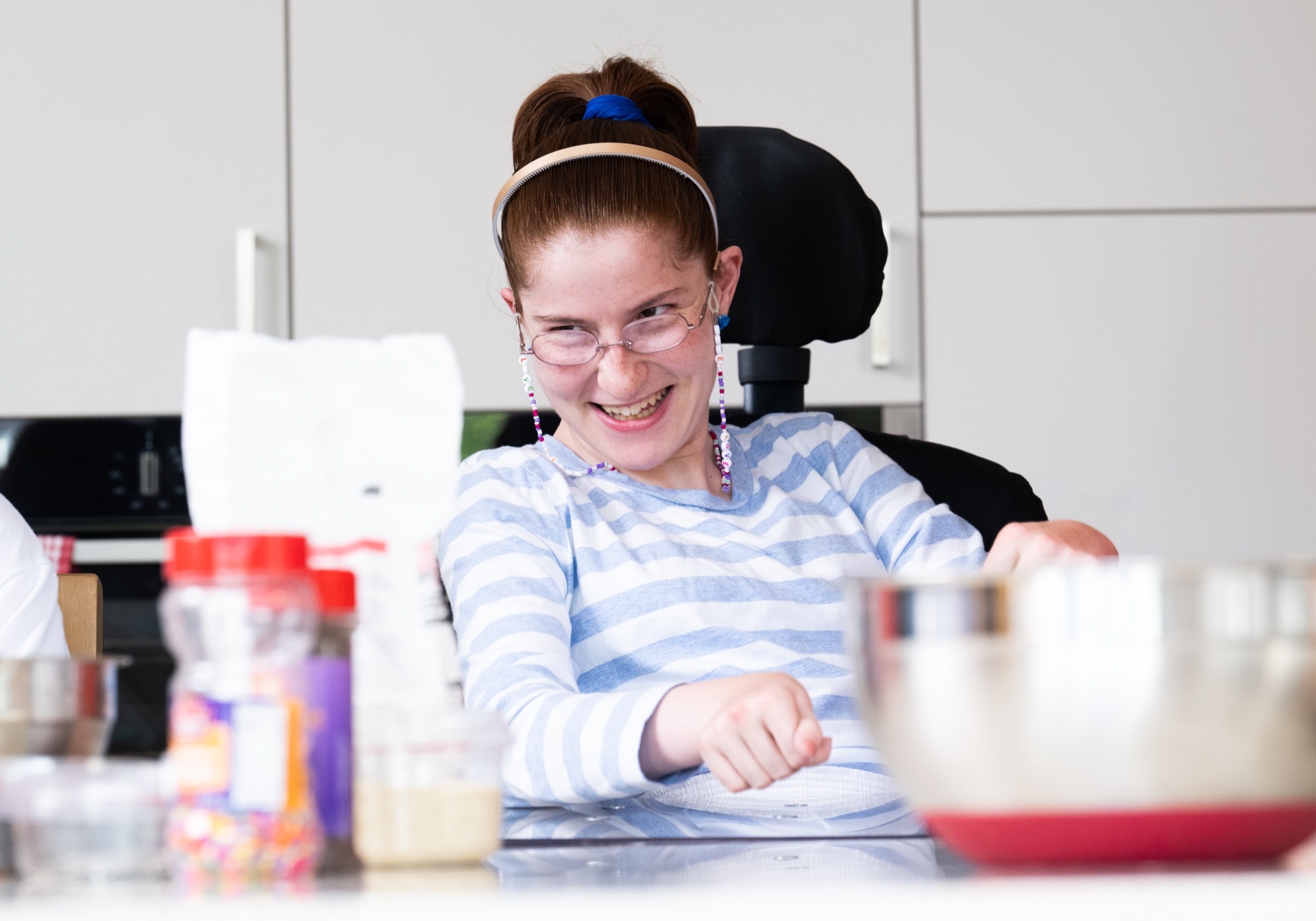 A support worker and member reviewing a care plan together